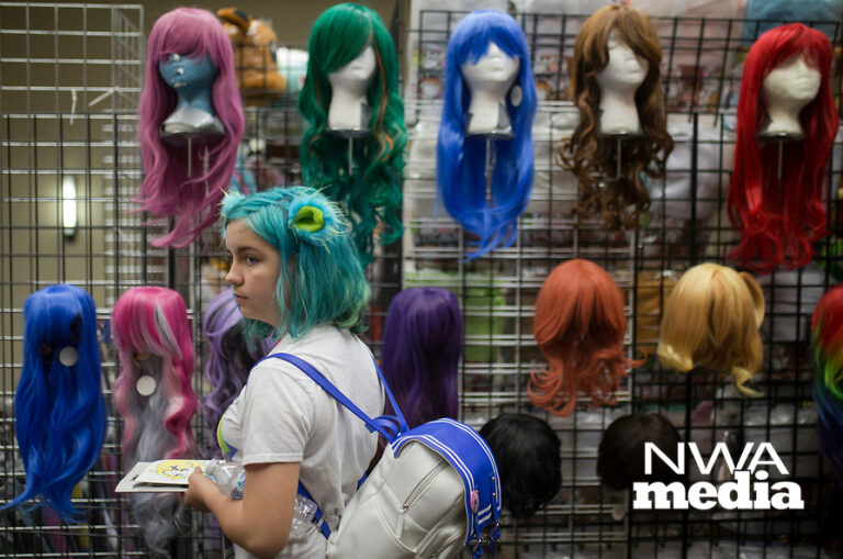 NWA Democrat-Gazette/CHARLIE KAIJO Cary Humphries of Rogers looks at wigs on Sunday, November 12, 2017 at Four Points Sheraton Hotel in Bentonville. The Hotel hosted the Arkansas Anime Festival - Northwest Arkanas Edition 2017. Fans enjoyed product displays, gaming parties and artist Q&As